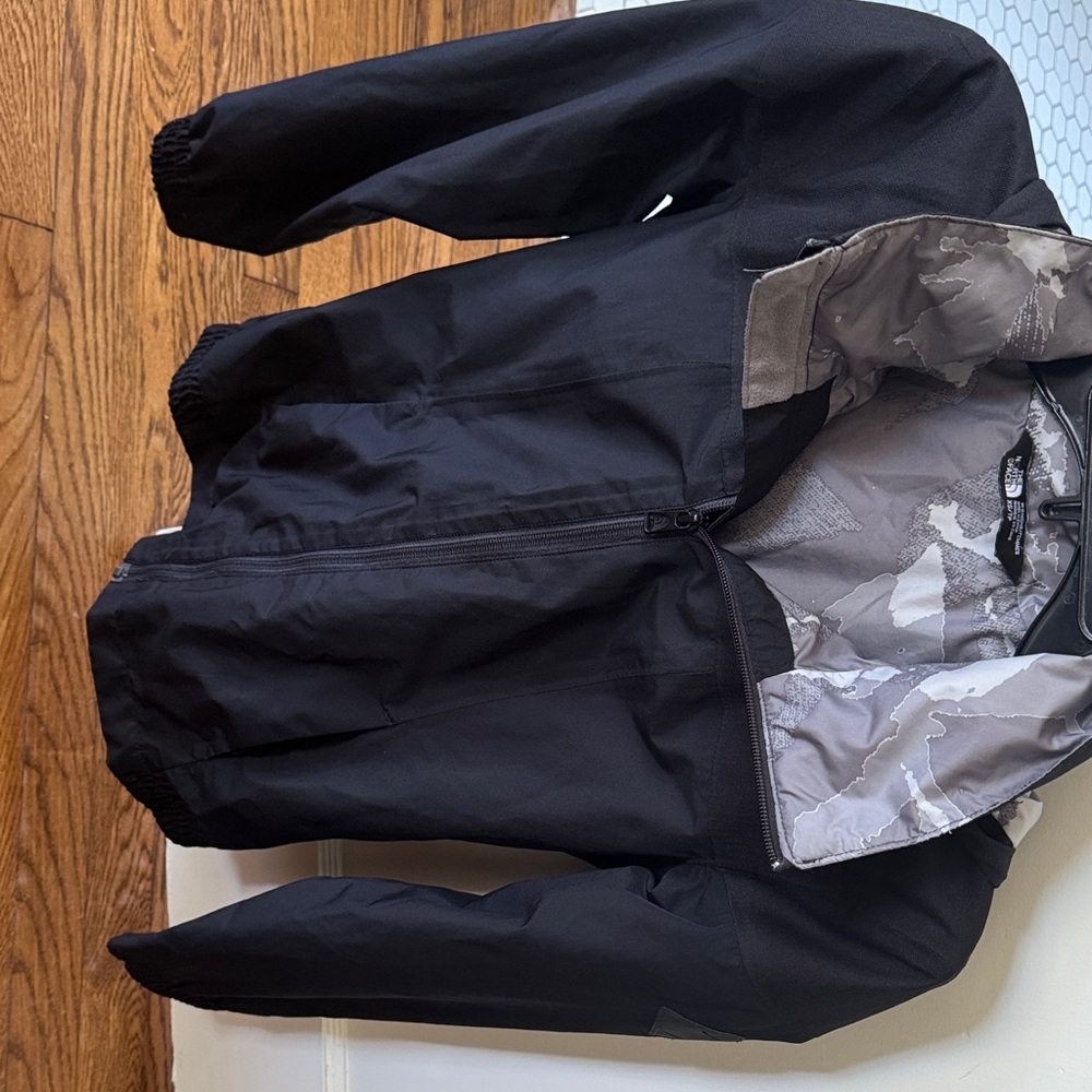 The North Face Black Rain Jacket with Gray Camouflage Lining